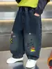 Pantalones de Peluche para Niños Otoño Invierno 2026 Nuevos Elegantes para Niños Pequeños Monopieza de Peluche Estampado de Dibujos Animados Jeans Ropa de Invierno