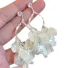 Pendientes de Borla con Forma de Pétalo de Concha Estilo Francés para Mujer 2026 Verano Lujo Ligero Diseño de Gama Alta Pendientes