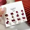 Pendientes de Copo de Nieve de Terciopelo para Mujer Nicho de Gama Alta Pendientes Rojos de Año Nuevo Otoño e Invierno 2025 Nuevo Estilo Caliente Pendientes de Año Nuevo
