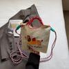 Bolsa de Mão de Nylon Estilo Japonês Ins Bolsa de Ombro Bordada Feminina Casual Porta-Moedas para Celular Bolsa Transversal Leve e Moderna