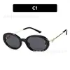 Novos óculos de sol americanos retrô de armação pequena oval com design torcido inspirado na Chanel, oferecendo um visual de luxo leve e elegante, adequados para viagens de carro à beira-mar e uso versátil