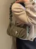 Bolsa Feminina de Ombro Único/Axila Design de Nicho Francês Popular Transfronteiriça 2025 Nova Bolsa Meia-Lua Plissada Bolsa de Textura para o Dia a Dia