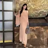 Novo Estilo Outono Inicial 2026 Vestido Preguiçoso e Elegante Tipo Manto com Design Falso de Duas Peças em Preto Sólido