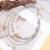 Tendência da moda europeia e americana, rebite de cabeça dupla, corrente de costura de mola cilíndrica, corrente de calças de metal multicamadas, joias legais