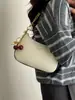Moda estilo coreano simple y elegante color liso gran capacidad otoño 2026 nuevo popular bolso cruzado de hombro para mujer