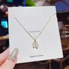 Colección de Collares de Acero de Titanio, Estilo Celebridad de Internet, Cadena para la Cintura Incrustada con Diamantes, Piedra Ojo de Gato, Collar de Flor de Tulipán