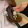 Pendientes de gota con incrustaciones de diamantes transfronterizos europeos y americanos, pendientes de lujo de alta gama, accesorios para orejas de moda de nicho, venta al por mayor desde fabricante de Yiwu