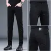 Jeans Masculino Preto de Algodão Puro Elástico, Não Desbota, Novo Estilo Outono/Inverno 2026, Estilo Coreano, Corte Slim Reto, com Forro de Lã e Espessado