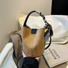 Bolso de Mano para el Trabajo 2025 Nuevo Estilo Bolso Cubo Simple y de Moda Bolso de Hombro Versátil Bolso de Atmósfera de Alta Gama para Mujer