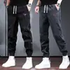 Pantalones casuales de pana para otoño para hombre, nuevos pantalones jogger de chenille patchwork de corte holgado, pantalones deportivos de marca de moda