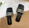 Sandalias tejidas de moda de comercio exterior 35-42 talla grande punta cuadrada planas sandalias banda elástica para mujer chanclas con letra cruzada