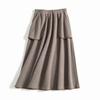 Comercio exterior exportación tweed de lana única temperamento casual suelto cintura elástica forma A bolsillo grande falda larga otoño e invierno para mujer