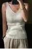 Camisola de punto con cuello en V para mujer de primavera y otoño, diseño escotado, acento en la clavícula, adecuada para usar en capas, elástica, sin mangas, top básico