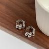 Pendientes de Aro Metálicos Huecos con Giro Espiral Orejera Coreana de Alta Gama Hebilla de Oreja Distintiva Lujo Ligero Moda Francesa Aro de Oreja para Mujer