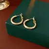 Brincos de Aro Dourado Estilo Minimalista Transfronteiriço Europeu e Americano, Simples e Elegantes, Design de Aro Ousado, Brincos de Nicho Atacado