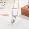 Nuevo collar de lazo de amor con circonita de diamante rosa para mujer, diseño de nicho de lujo ligero, cadena para la clavícula con circonita de diamante púrpura de alta gama