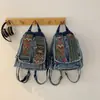 Bolso cruzado informal de mezclilla transfronterizo para mujer, estilo de alta gama, nuevo diseño moderno y genial 2026, bolso cruzado o de hombro de moda para mujer