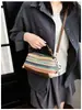 Bolso de mano tejido a rayas para mujer, nuevo de moda verano 2026, colorblock, bolso de hombro cruzado para vacaciones en la playa