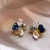 Nuevos pendientes de flor de colores con perla y aguja de plata, pendientes de nicho de alta gama con un diseño versátil y elegante, pendientes de lujo ligero para mujer