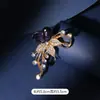 Broche de Mariposa para Mujer Sentido de Gama Alta Nicho Venta al por Mayor Pin de Perla Temperamento Fijo Metal Traje Joyería de Perlas