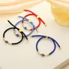 Europa y Estados Unidos pulsera ojo azul transfronteriza cuerda de mano ojo del diablo retro pulsera ojo tejida a mano ajustable venta al por mayor