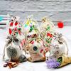 Joyería al por mayor de fábrica algodón y lino bronceado bolsillo con cordón estampado embalaje bolsa de regalo joyería