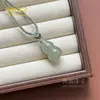 Pendente Fivela da Paz Aventurina Jade Seda Dourada de Xinjiang Pingente de Buda Amuleto da Paz Colar Gota d'Água Fonte de Suprimento para Transmissão ao Vivo
