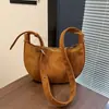 Bolso retro de nicho con estampado de leopardo para mujer 2026 nuevo bolso cruzado casual versátil de un solo hombro bajo el brazo tipo cuerno