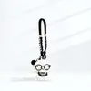 Colgante de Peluche Lindo Cachorro con Gafas Correa para Bolso Muñeco Adorno Regalo de Navidad Llavero Correa para el Cuello