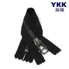 Número genuino YKK. 5 cremallera metálica de extremo cerrado de plata antigua cremallera de chaqueta acolchada de tela negra