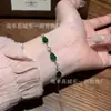 Venta al por mayor del fabricante: Pulsera de Calabaza de Jade Verde Natural Xiaohongshu con Incrustación de Plata S925, Nuevo Diseño de Estilo Chino