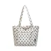 Tendencia transfronteriza bolso de hombro individual de gran capacidad para el trabajo, diseño japonés simple de lunares, bolso de mano tipo tote de alta gama relajado