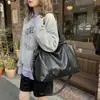 Bolso de hombro estilo coreano más vendido 2026 bolsa de viaje vintage para mujer bolso de mano casual bolso de mano retro de gran capacidad