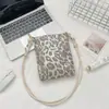 68291 Bolso cruzado de lunares estilo coreano con correa de hombro ajustable anudada, bolso para teléfono para niñas, bolso de hombro pequeño de tela con estampado de leopardo