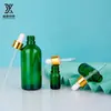 Botella de aceite esencial verde de fábrica de 10 ml botella con gotero de 30 ml botella pulverizadora botella de vidrio para cosméticos botella cuentagotas