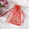 Bolsa de gasa bauhinia multicolor para bronceado en stock al por mayor bolsa de organza para dulces de boda con cordón paquete de regalo de boda bolsillo