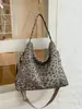Bolso de hombro con estampado de leopardo estilo coreano, gran capacidad, diseño simple de lona, casual y versátil, moderno para ir al trabajo y un práctico bolso tote