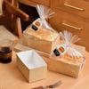 Nueva caja de embalaje para hornear pasteles resistente a altas temperaturas, caja de embalaje para pan de postre, soporte de papel desechable para pastel de almohada dorado de papel Kraft