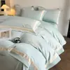 El fabricante suministra juego de cuatro piezas de bordado de aplique de algodón de fibra larga para ropa de cama de lujo ligero de alta gama para uso doméstico, incluyendo fundas de edredón y sábanas, al por mayor