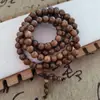 Pulsera de 108 Cuentas Budistas Multicírculo Sándalo Pulsera Bicolor Madera de Ala de Pollo Rosario Adornos de Madera para la Mano Suministro en Vivo
