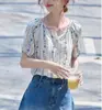 Camisa Floral Solta com Bordado Floral Estilo Francês Preguiçoso de Manga Raglan para Mulheres Verão 2026