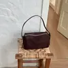 Bolso liso transfronterizo para mujer 2026 otoño nuevo elegante retro casual bolso cruzado bolso de mano de un solo hombro bolso cilíndrico