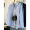 Camisa Retrô Listrada Azul Estilo Francês Preguiçoso Feminina Design de Primavera e Outono Senso de Design Nicho Manga Longa Camisa Jaqueta para Camadas