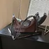 Bolsa Suede Retro Design de Nicho Feminina 2026 Nova Outono Casual Transversal Estilo Coreano Ombro Único Bolsa Bolinho