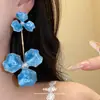 Aretes de flor de perla con goteo de aceite de aguja de acero, aretes dulces exagerados exquisitos estilo europeo y americano, aretes de moda de lujo ligero de alta gama para mujer