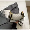 Bolso de mano de moda retro con estampado de comercio exterior, estilo nuevo, alta gama, bolsa de nicho con forma de media luna, bolso de hombro y bolso cruzado versátil