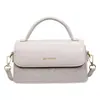 Bolso pequeño retro de alta gama para mujer 2026 nuevo elegante versátil bandolera bolso de mano de color sólido exquisito bolso cuadrado pequeño
