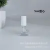 Venta al por mayor de botellas de esmalte de uñas creativas de vidrio de 5 ml, botella vacía con forma de esmalte de uñas, botella pequeña dividida con pincel.