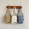 Bolsa Pequena de Lona Estilo Japonês Estilo Coreano Feminina Nova Primavera 2024 Leve Casual Prática Ombro Transversal Bolsa para Celular