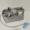 Bolsa interior de fieltro transfronteriza, bolsa de maquillaje de fieltro, bolsa de viaje para mamá con cremallera y múltiples compartimentos, bolsa de almacenamiento de cosméticos multifuncional